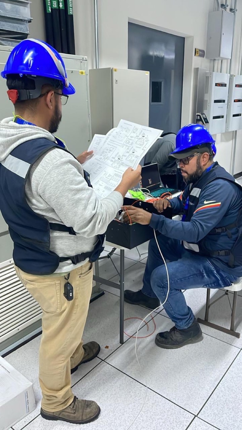 Innovati engineers reviewing blueprints on site